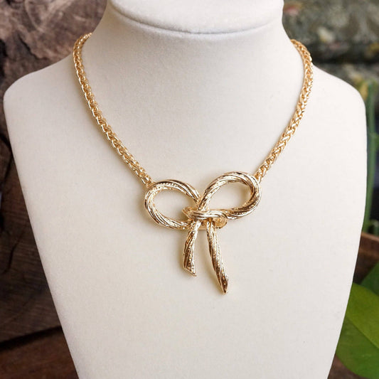 The Golden Grace Bow Necklace